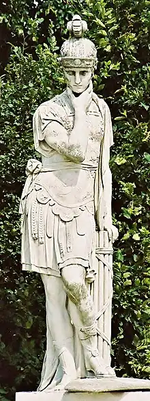  colour photograph of a white statue of a man in ancient Roman armour