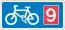 Rectangular, blue traffic sign with a white bicycle symbol and a red square with the number 9 in it.