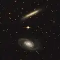 NGC 3454 (top) and NGC 3455 (bottom) with the legacy surveys