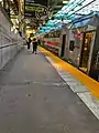 A multi-level NJ Transit train at Newark Penn Station