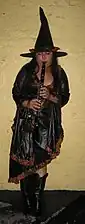 Clarinet-playing witch in a New Orleans Halloween parade