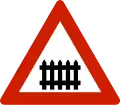 Level crossing with a barrier or gate