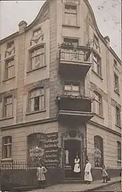 Tenement on a 1914 postcard