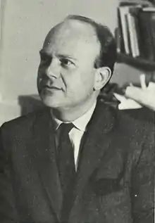 Photo of Nándor Balázs shown looking up to his right, from the 1966 Stony Brook University Yearbook