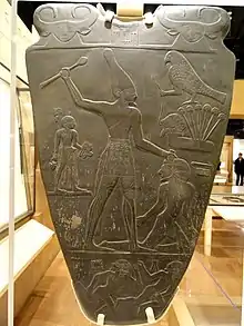 Facsimile of the Narmer Palette, c. 3100 BCE, which already shows the canonical Egyptian profile view and proportions of the figure