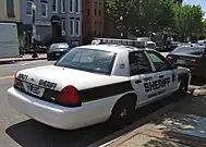 Nassau County Deputy Sheriff Ford Crown Victoria (Striped black/gold & lettered Deputy Sheriff).