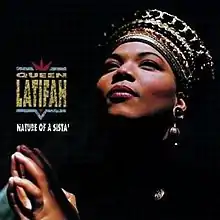 An image of Queen Latifah in an African-style headdress; the album title and her name are superimposed over the image