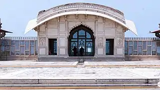 The Naulakha Pavilion in Lahore Fort, Pakistan, features a Do-chala roof originating in Bengal.