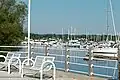 Boats and benches by Frenchman's Bay by Millennium Square