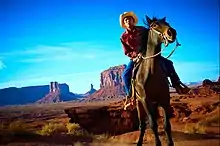 Image 10A Navajo man on horseback in present-day Monument Valley in Arizona (from Indigenous peoples of the Americas)