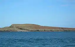 Nave Island from Ardnave Point with the ruined chapel just visible at left