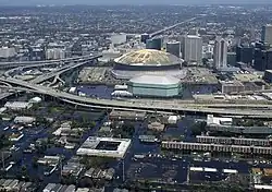 An aerial view of a heavily flooded city district