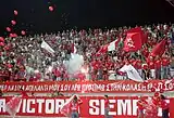 Nea Salamina Famagusta FC fans at Ammochostos Stadium in a game against Enosis Neon Paralimni FC in season 2006–07.