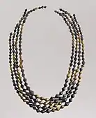 Sumerian necklace beads; 2600–2500 BC; gold and lapis lazuli; length: 54 centimetres (21 in); Metropolitan Museum of Art