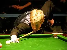 Neil Robertson playing a shot