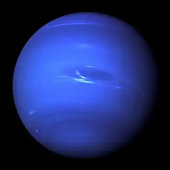 Image 13NeptunePhotograph credit: NASA / JPLNeptune is the eighth and farthest known planet from the Sun in the Solar System. In the Solar System, it is the fourth-largest planet by diameter, the third-most-massive planet and the densest giant planet. Neptune is 17 times the mass of Earth, slightly more massive than its near-twin Uranus. Neptune is denser and physically smaller than Uranus because its greater mass causes more gravitational compression of its atmosphere. Neptune orbits the Sun once every 164.8 years at an average distance of 30.1 au (4.5 billion km; 2.8 billion mi). It is named after the Roman god of the sea and has the astronomical symbol ♆, a stylised version of the god Neptune's trident.This picture of Neptune was taken by NASA's Voyager 2 spacecraft in 1989, at a range of 4.4 million miles (7.1 million kilometres) from the planet, approximately four days before closest approach. The photograph shows the Great Dark Spot, a storm about the size of Earth, in the centre, while the fast-moving bright feature nicknamed the "Scooter" and the Small Dark Spot can be seen on the western limb. These clouds were seen to persist for as long as the spacecraft's cameras could resolve them.More selected pictures