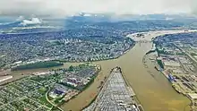 Aerial photo of the downtown area and eastward along the Fraser River