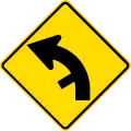 (PW-26) Curve between 15 and 90 degrees with minor road, to left