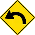 (W12-1.3/PW-18) Sharp curve between 90 and 120 degrees, to left