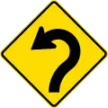 (W12-2.3/PW-22) Reverse curve with decreasing radius, to left