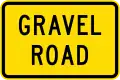 (W14-7.3/PW-41.3) Road has slippery gravel surface