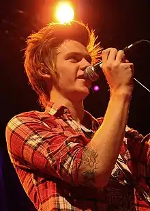 Santino performing with A Rocket to the Moon in 2010