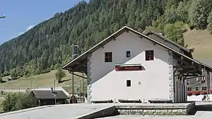 Two-story building with gabled roof