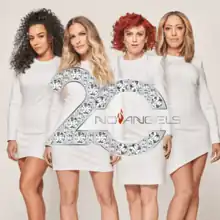 Four women standing in white dresses against a neutral backdrop, with the words "20" and "No Angels" written.