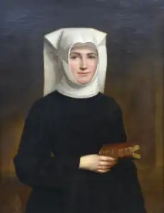 Portrait of a nun holding a book