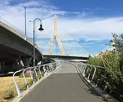 The western end of the North Bank Bridge with Zakim Bridge in background, Cambridge