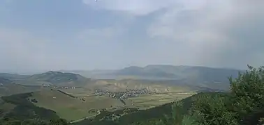 The northern part of Armenia's northern province of Lori as seen from Pushkin Pass. Visible in this picture is the village of Agarak (background, right)