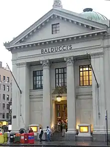 The main facade of the building on Eighth Avenue, as seen in 2008. The name "Balducci's" is visible near the top of the building.