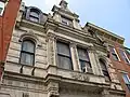 Elaborate ornamentation of an Elm Street building