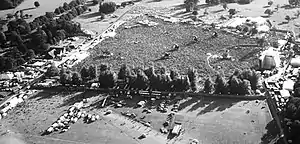 An overhead black-and-white image of a large crowd