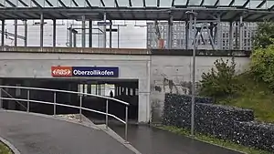 Elevated canopy-covered platforms with underpass