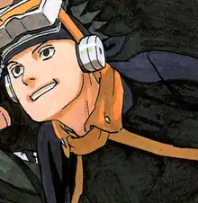 A black-haired and black-eyed character in Naruto wearing dark blue and orange clothing, a headband, and goggles