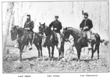 Black and white photo of three officers of the 18th Pennsylvania Cavalry.