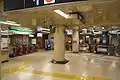 The west side ticket barriers next to the ticket barriers to Ogawamachi Station in May 2007