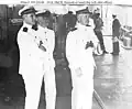 Husvtedt (right) as a lieutenant commander aboard ship with two other officers, ca. 1921-1924