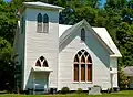 The Omaha Baptist Church was established in the late 1800s. The present building was constructed in 1914 following a tornado that destroyed much of the town including the original church building in 1913.