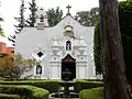 Single-eyed bell gable of the Amaxalco oratory, in Tlalpan, Mexico.