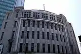 The central feature of the Oriental Building consisting of perpendicular piers running up three storeys.