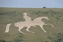 White horse with George III riding; Osmington White Horse near Weymouth, Dorset