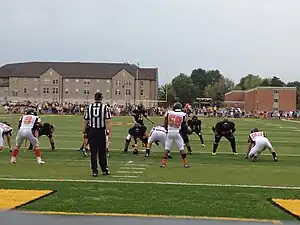 Field level view of game in play (south end zone facing north).