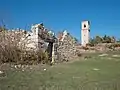 The abandoned town of Ochate, with the tower of the ancient San Miguel Church