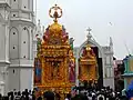 Two Golden cars procession