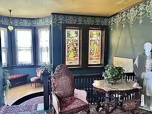 Main staircase landing and stained glass