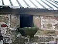 Owl hole at Roughwood Farm, Scotland.