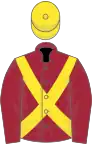 Maroon, yellow cross belts, yellow cap