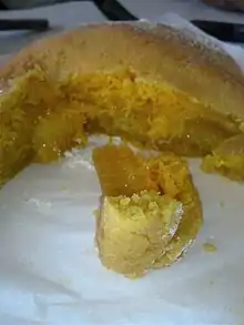 Opened showing the fios de ovos (sweetened egg yolk threads)